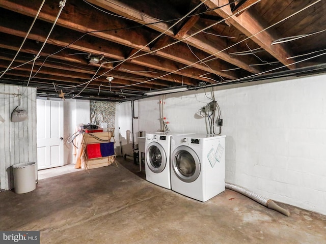 basement with washing machine and clothes dryer