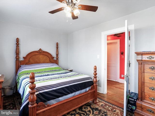 bedroom with hardwood / wood-style floors and ceiling fan