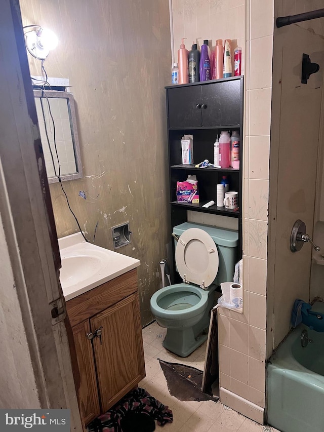 full bathroom with vanity,  shower combination, and toilet