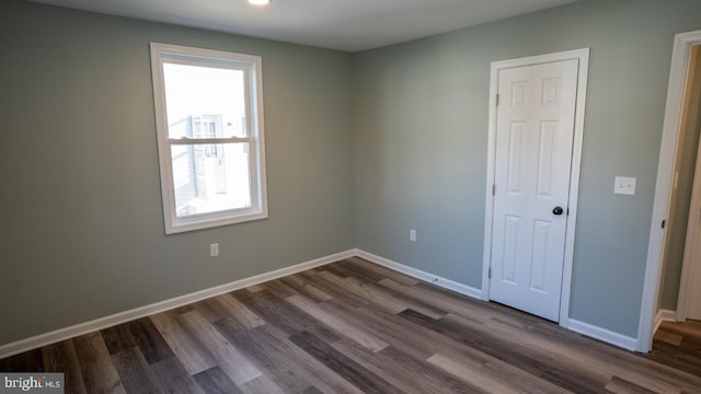 interior space with dark wood-type flooring