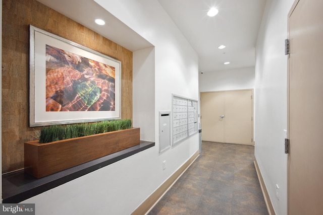 hallway with mail boxes