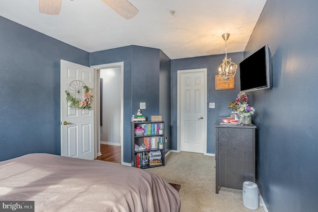 bedroom with ceiling fan and carpet