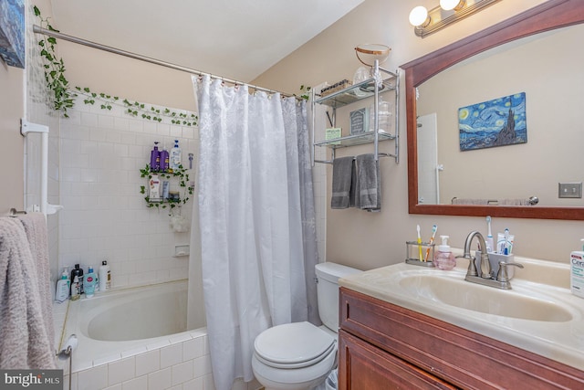 full bathroom featuring vanity, toilet, and shower / bath combo