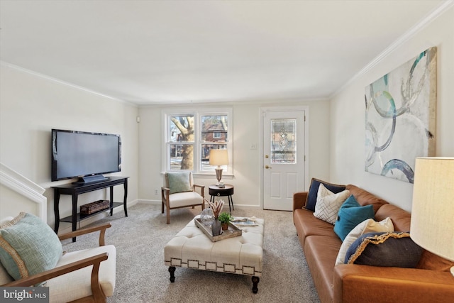 living room featuring ornamental molding and carpet