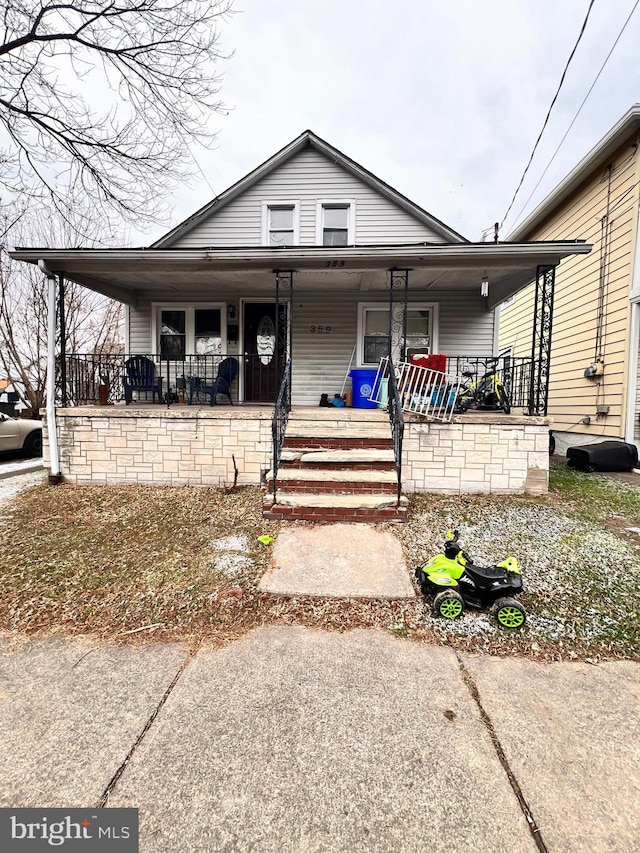 bungalow-style home with a porch