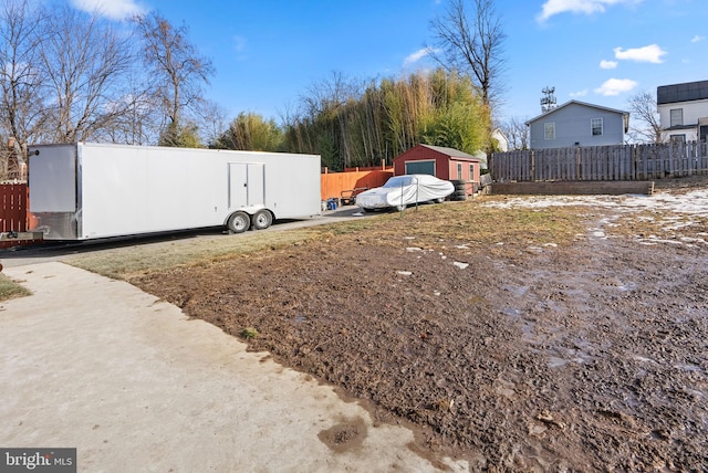 view of yard with a storage shed