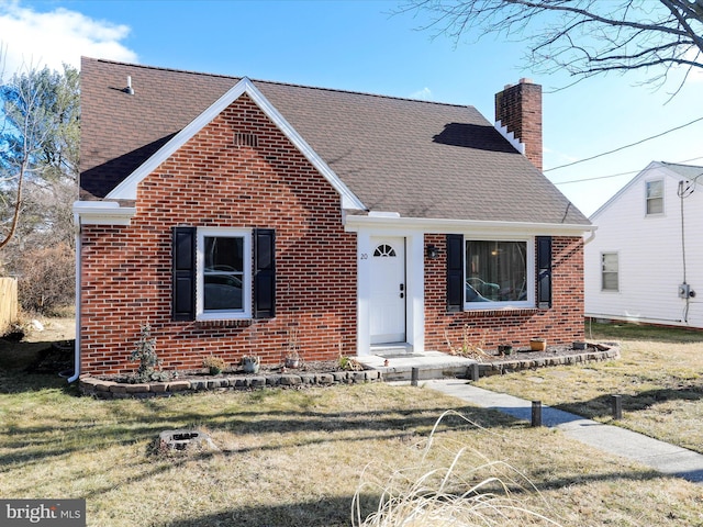 view of front of home with a front yard