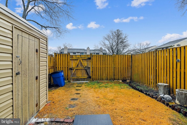 view of yard with a storage shed