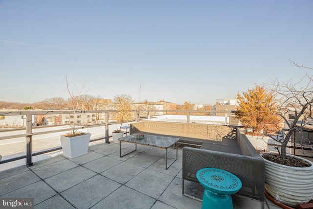 view of patio / terrace featuring an outdoor living space and a balcony