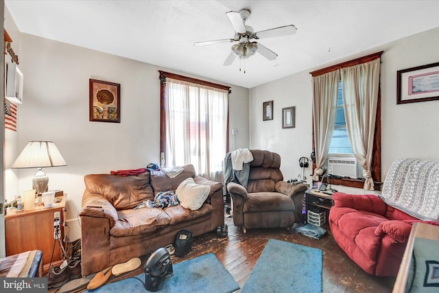 living room with cooling unit and ceiling fan