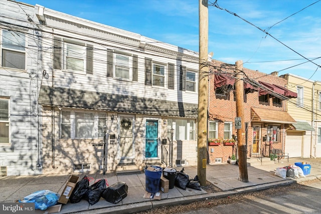 multi unit property featuring a patio area