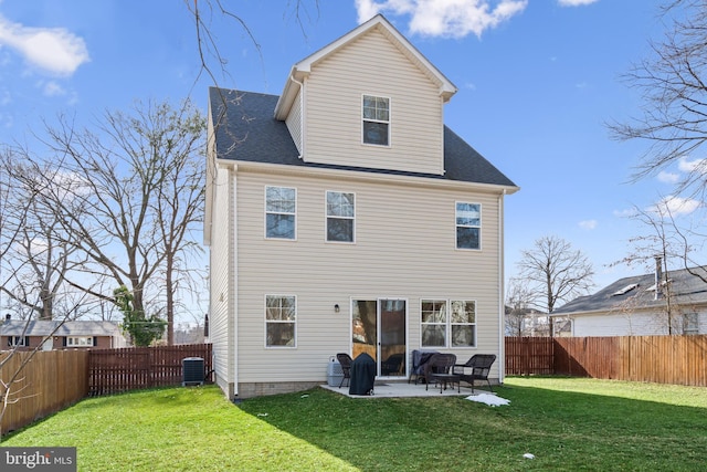 rear view of house featuring a patio area, a lawn, and central air condition unit