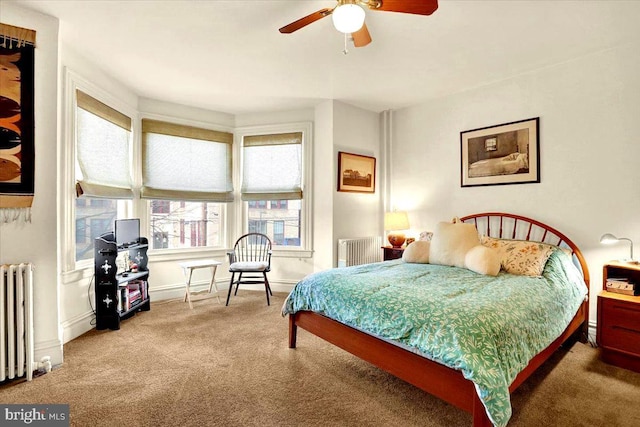 carpeted bedroom featuring radiator heating unit