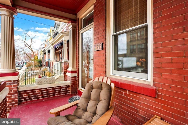 balcony featuring covered porch