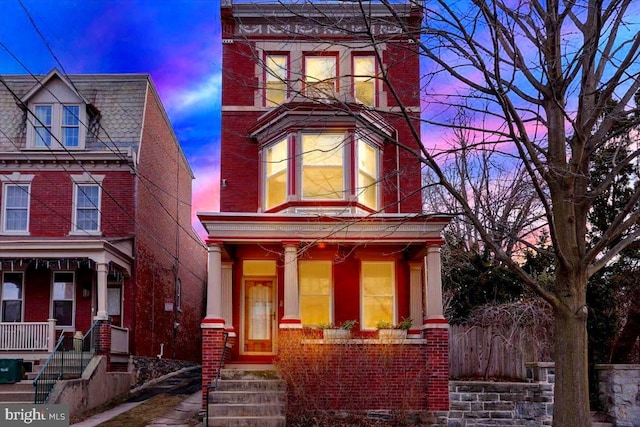 view of front of home featuring covered porch