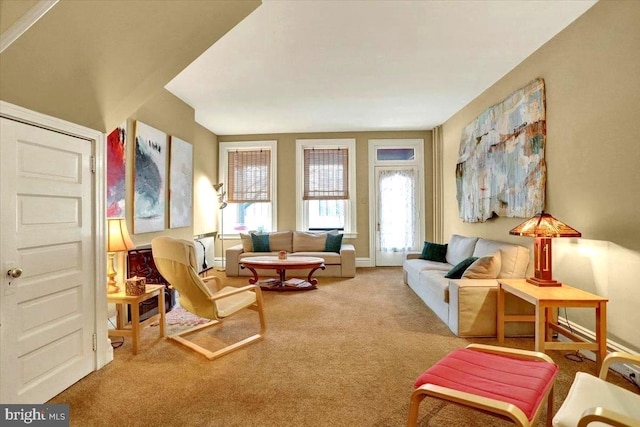 sitting room with light colored carpet