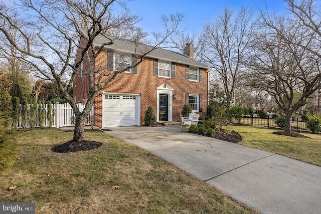 view of front facade featuring a garage and a front yard