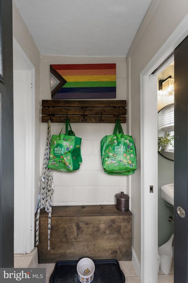 mudroom with light tile patterned floors