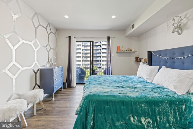 bedroom with wood-type flooring