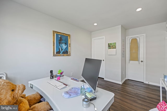 home office with dark wood-type flooring