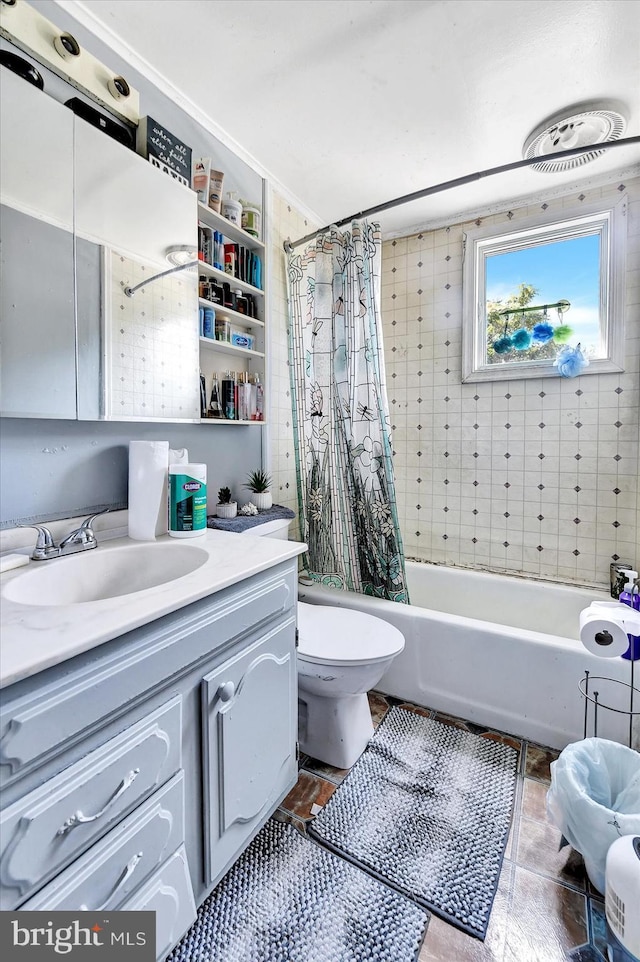 full bathroom featuring vanity, shower / tub combo, and toilet