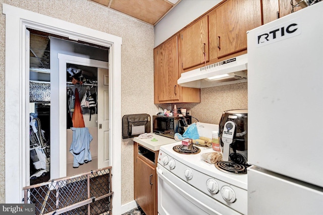 kitchen with white appliances