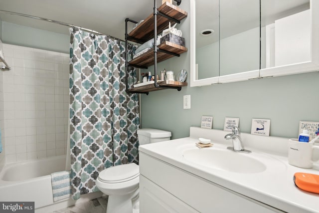 full bathroom with vanity, shower / bath combination with curtain, and toilet