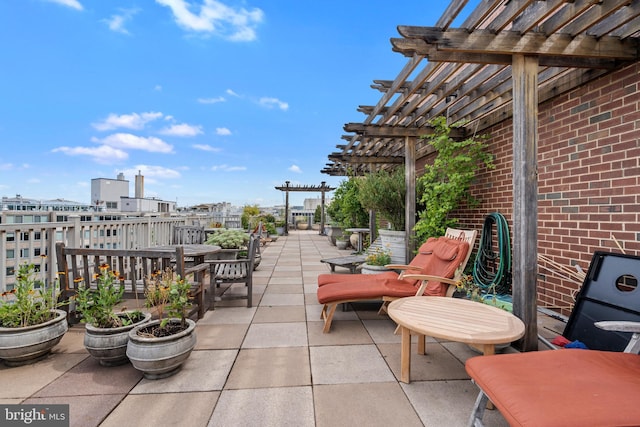 view of patio featuring a pergola