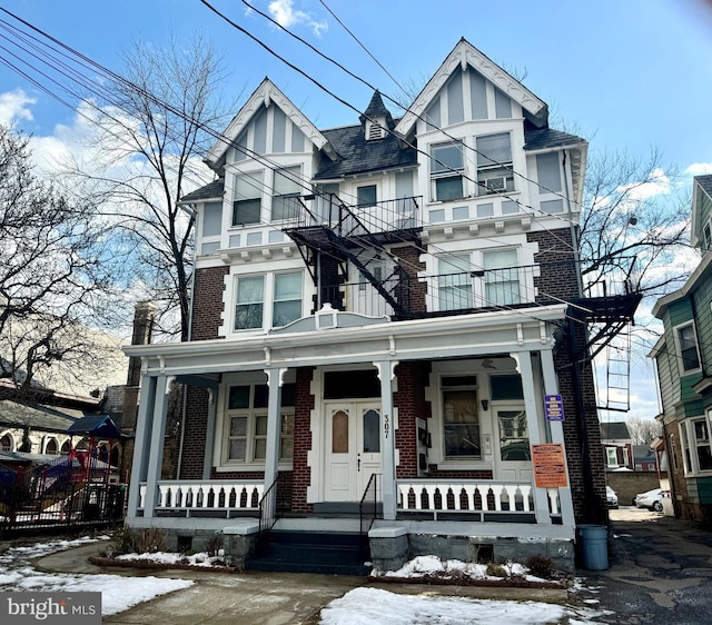 tudor home with a porch