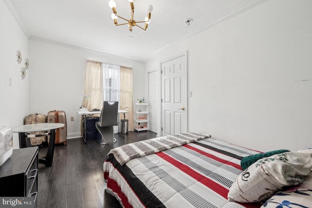 bedroom featuring crown molding, dark hardwood / wood-style floors, and a notable chandelier