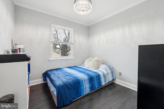 bedroom featuring crown molding, dark wood-type flooring, and a notable chandelier