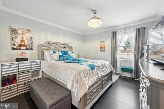 bedroom with ornamental molding and dark hardwood / wood-style flooring