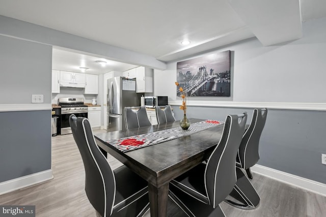 dining area featuring light hardwood / wood-style flooring