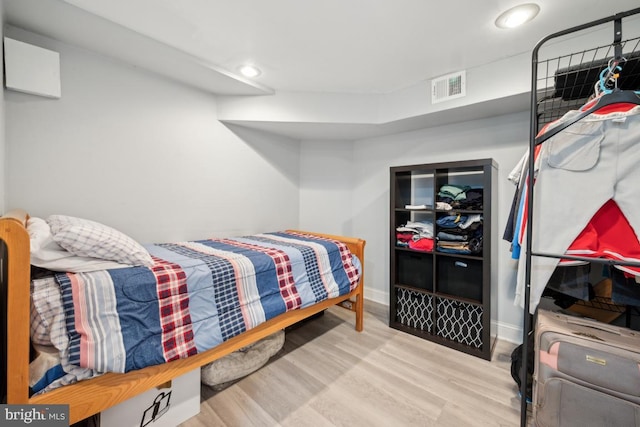 bedroom featuring wood-type flooring