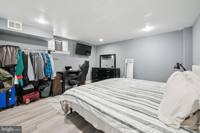 bedroom featuring light hardwood / wood-style floors