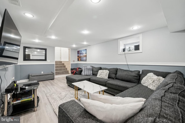 living room with light hardwood / wood-style floors