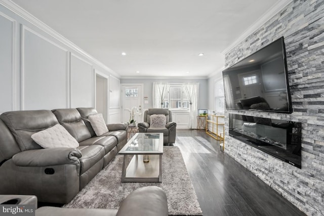 living room with ornamental molding and dark hardwood / wood-style flooring