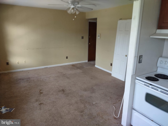 kitchen with white electric stove, light carpet, exhaust hood, and ceiling fan