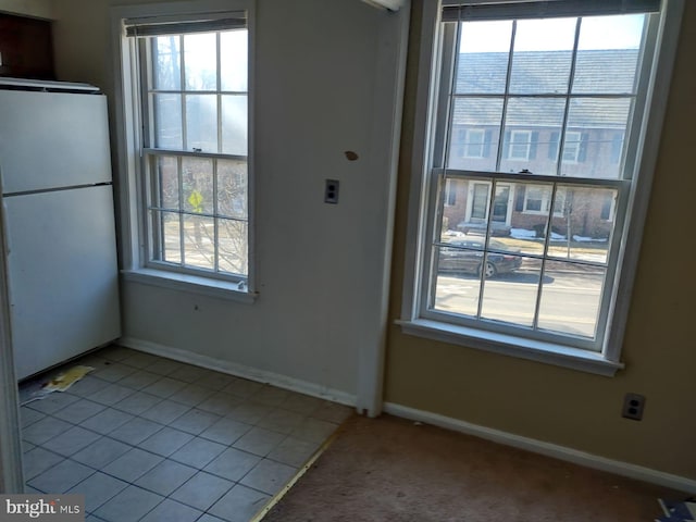 interior space featuring tile patterned flooring