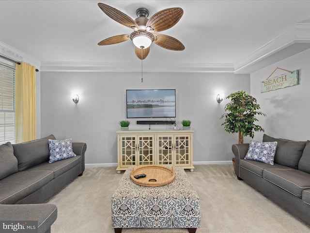 living room with crown molding, light colored carpet, and ceiling fan