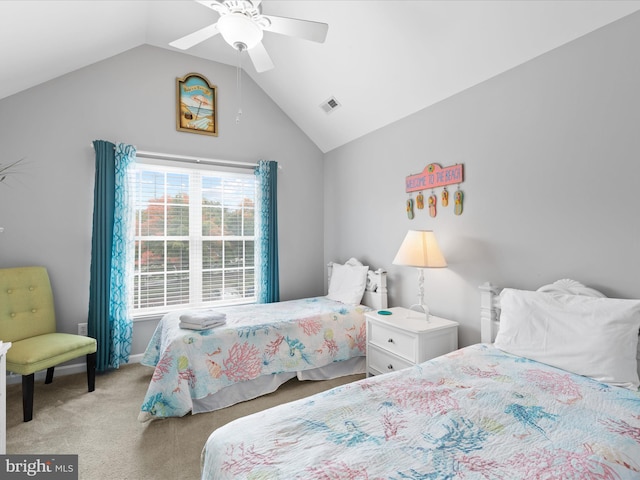 bedroom featuring lofted ceiling, light colored carpet, and ceiling fan