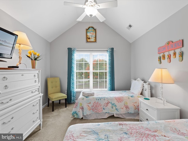 carpeted bedroom with lofted ceiling and ceiling fan