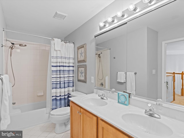 full bathroom featuring tile patterned flooring, vanity, toilet, and shower / tub combo with curtain