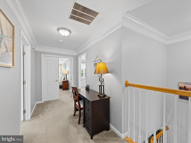 office area with ornamental molding and light carpet