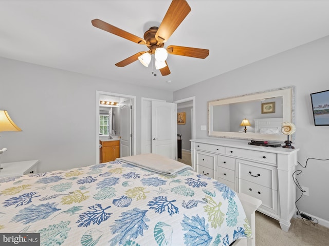 carpeted bedroom featuring connected bathroom and ceiling fan