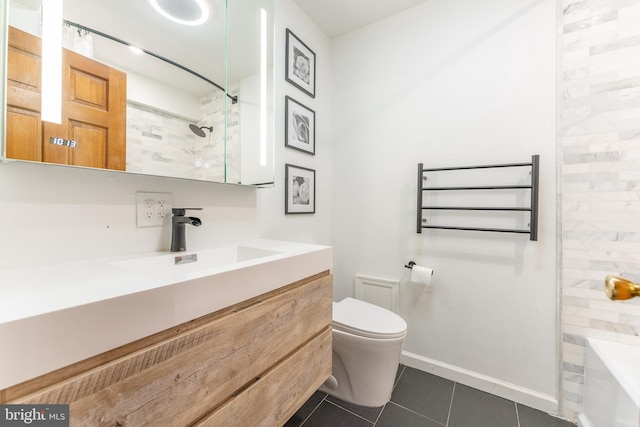 bathroom featuring tile patterned flooring, vanity, radiator heating unit, and toilet