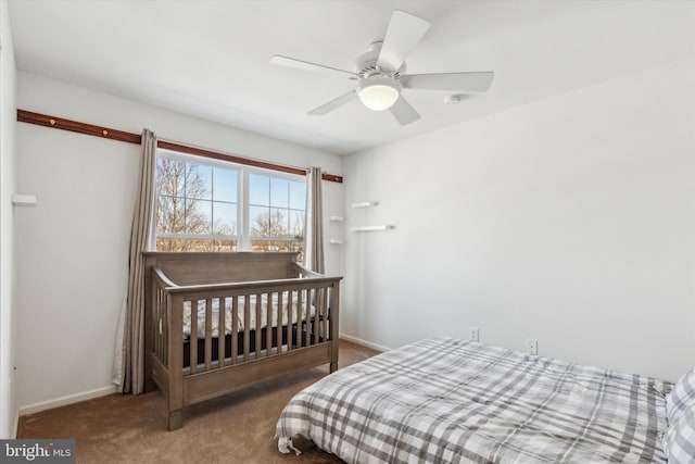 bedroom with ceiling fan and carpet