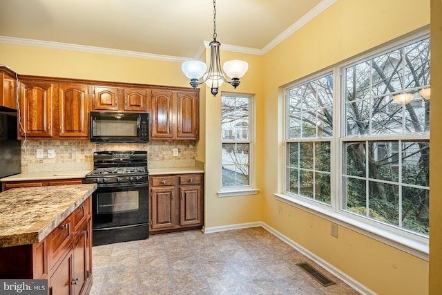 kitchen featuring tasteful backsplash, decorative light fixtures, black appliances, and crown molding