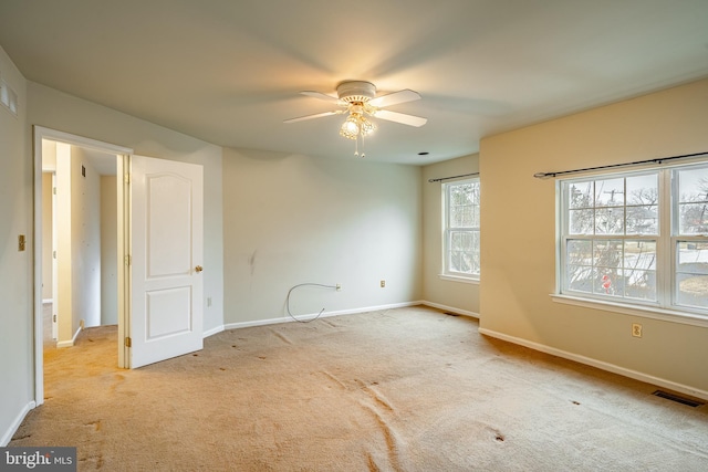 interior space featuring ceiling fan