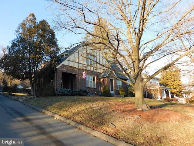 view of front of home with a front lawn